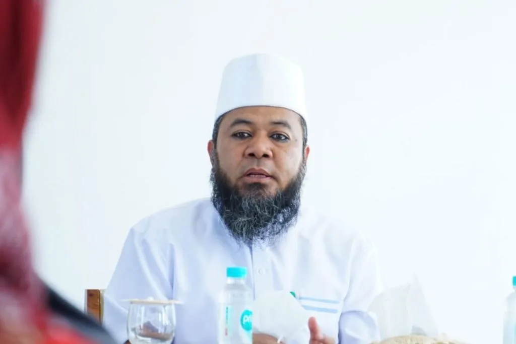 H Helmi Hasan SE