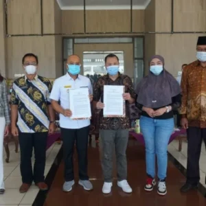 Bupati Gusnan MoU Kios Sekundang dan Jawara Dengan PT. DWN