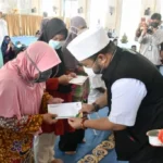 Puncak HUT ke-21 Bersama Walikota dan Wawali, Baznas Kota Bengkulu Bagikan Santunan