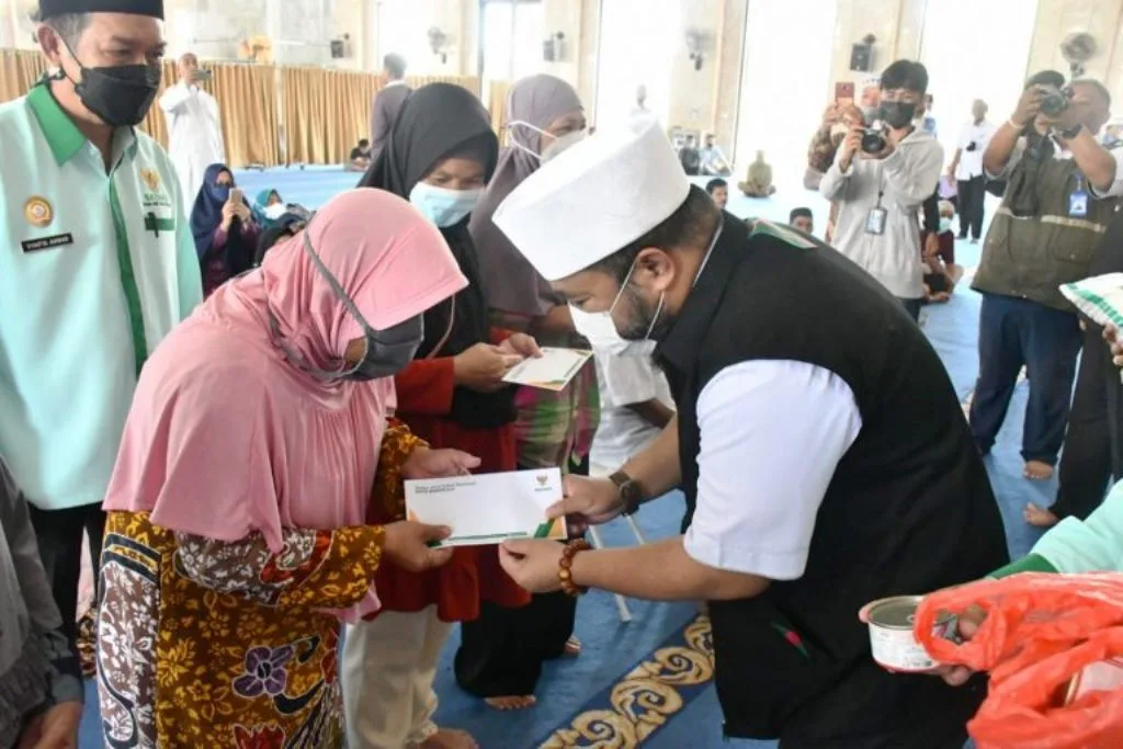 Puncak HUT ke-21 Bersama Walikota dan Wawali, Baznas Kota Bengkulu Bagikan Santunan
