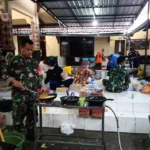 Personel Kodim 0826 Pamekasan Buka Dapur Umum Untuk Korban Banjir