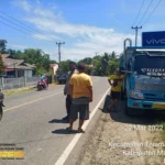 Tabrak Dump Truk, Pengendara Mio Terluka