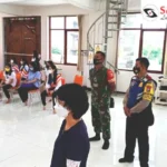 Babinsa Bersama Bhabinkamtibmas Amankan Ibadah Hari Waisak