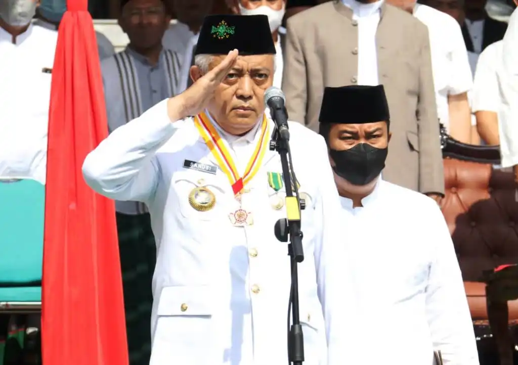 Bupati Malang, Drs. H.M. Sanusi, M.M. Menjadi Inspektur Upacara Peringatan Hari Santri Nasional Tahun 2022 di halaman Pondok Pesantren Modern Al-Rifaie, Desa Ketawang, Kecamatan Gondanglegi, Malang.