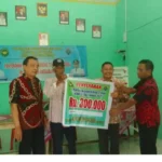 Pemdes Tanjung Besar Salurkan Bantuan BLT-DD Kepada 26 KPM