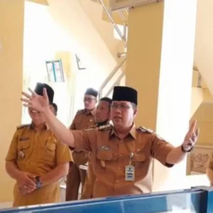 Kepala Dinas Perpustakaan dan Kearsipan (DPK), Meri Sasdi