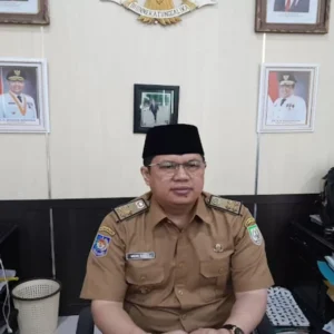 Kepala Dinas Perpustakaan dan Kearsipan Meri Sasdi