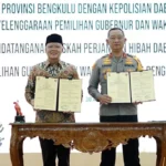 Gubernur Rohidin Tandatangani NPHD Hibah Anggaran Pengamanan Pilkada 2024