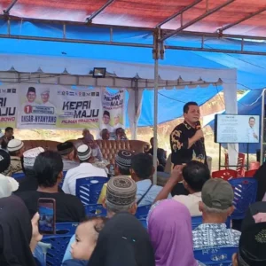 Diguyur Hujan, Warga Pasir Panjang Antusias Hadiri Kampanye Ansar Nyanyang Diguyur Hujan, Warga Pasir Panjang Antusias Hadiri Kampanye Ansar Nyanyang