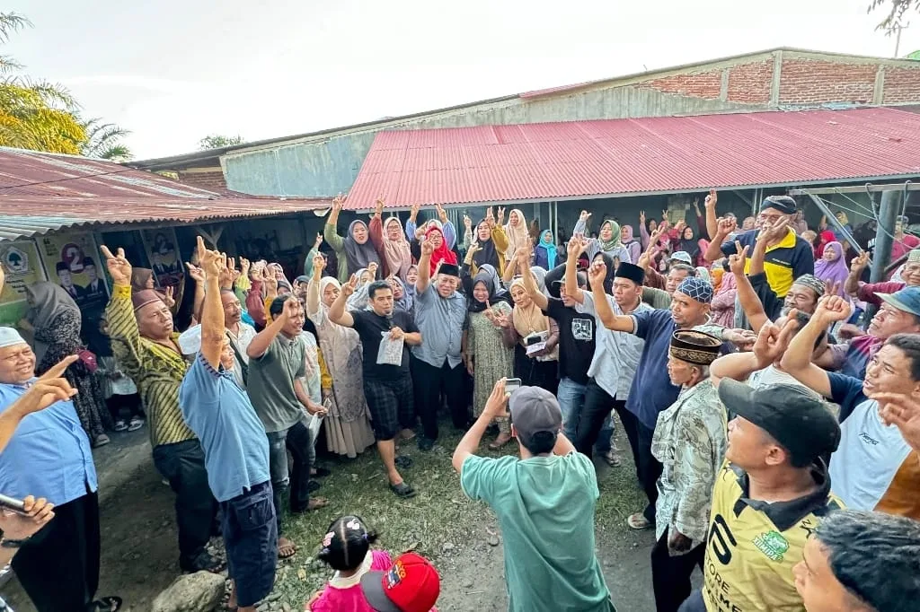 Pasangan Huda-Rahmadi Disambut Antusias di Desa Pulai Payung, Warga Minta Perbaikan Infrastruktur