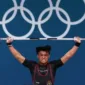 Rizki Juniansyah Sumbang Emas Pertama Indonesia di Olimpiade Angkat Besi